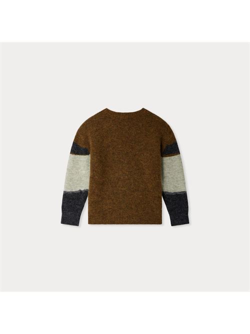 Maglione Javier in jacquard paesaggio con motivo cavallo Il maglione Javier da bambino si distingue per il suo suggestivo motivo a cavallo. Realizzato in misto lana e alpaca, questo modello dal taglio dritto privilegia calore e morbidezza.Realizzato principalmente in lana e alpacaGirocolloRifiniture a coste BONPOINT | W05BJUK00012946